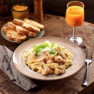 Garlic parmesan chicken pasta with a side salad