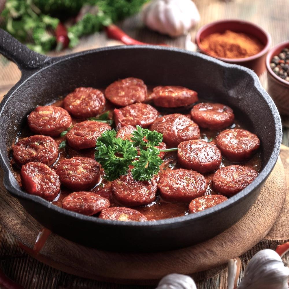 Beef chorizo cooking in a skillet