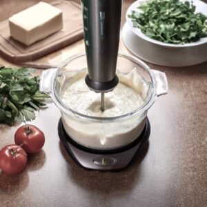 A bowl of silken tofu being blended