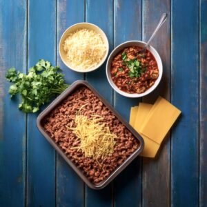 Ingredients for Mexican lasagna including tortillas, cheese, and enchilada sauce.