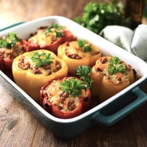 Chorizo stuffed bell peppers in a baking dish