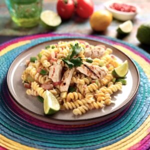 Mexican macaroni salad with grilled chicken on top