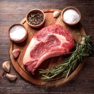 A raw chuck eye steak showing its marbling and texture