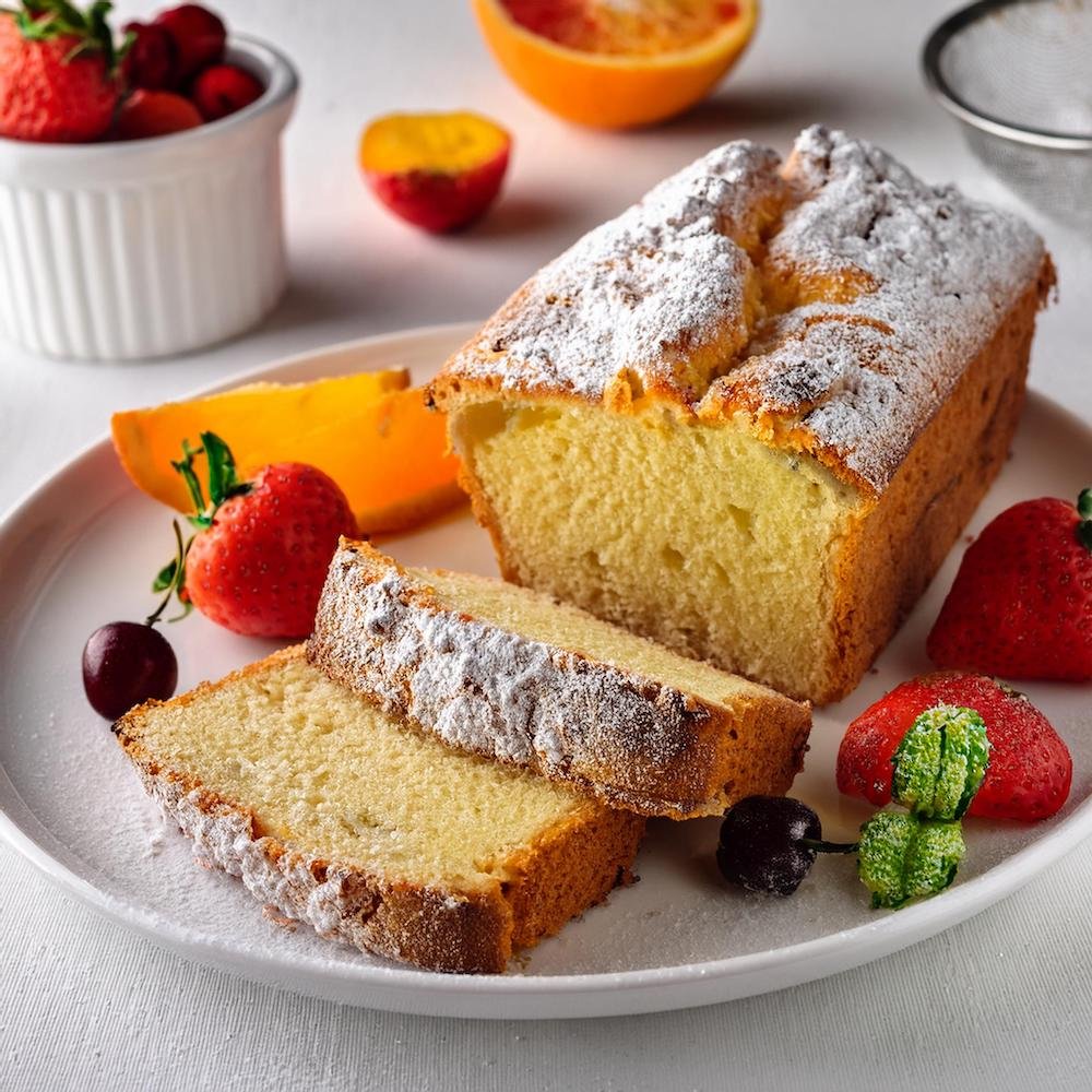 A dessert garbage bread filled with Nutella and bananas, dusted with powdered sugar.