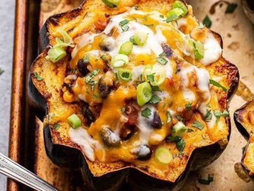 Delicious southwest stuffed acorn squash filled with beans and spices
