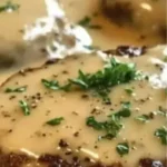 Amish Hamburger Steak Bake served with sides