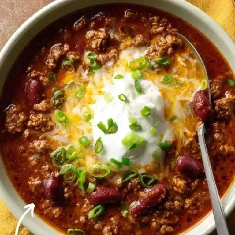 Bowl of award-winning championship chili recipe topped with fresh cilantro