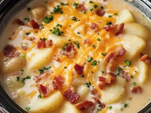 Crock Pot Crack Potato Soup served in a bowl with toppings