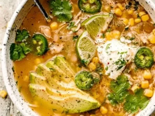 Delicious Crock Pot White Chicken Chili served in a bowl with toppings