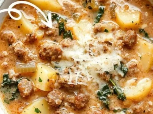 Creamy potato soup in a bowl with herbs and spices