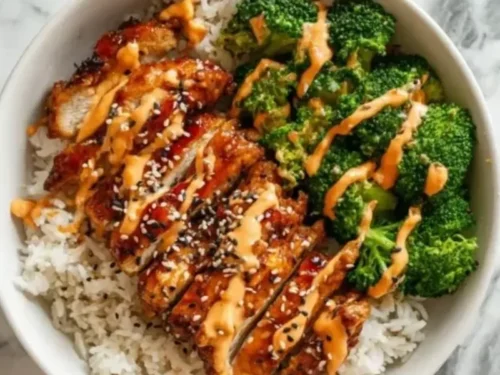 Delicious Sticky Chicken Rice Bowl with tender chicken and flavorful rice