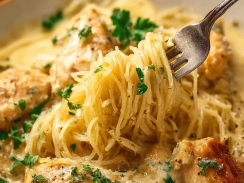 Delicious Crock Pot Angel Chicken with creamy sauce and pasta