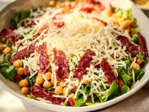 Fresh La Scala Chopped Salad featuring colorful vegetables and delicious dressing