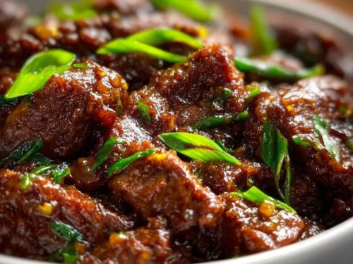 Delicious slow cooker Mongolian beef with broccoli served in a bowl