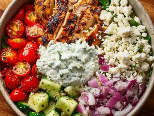 Delicious Greek Chicken Bowls with colorful vegetables and healthy ingredients