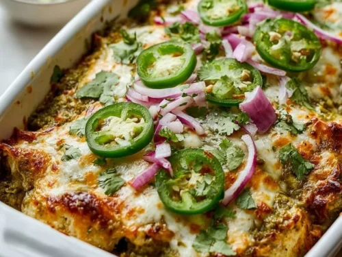 Healthy Salsa Verde Chicken Casserole topped with fresh ingredients on a plate