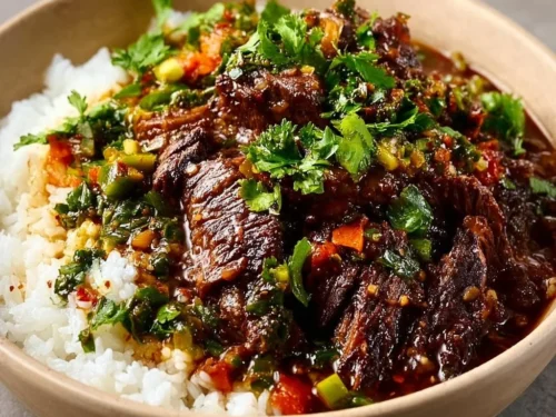Delicious Korean style pot roast garnished with vegetables and spices.